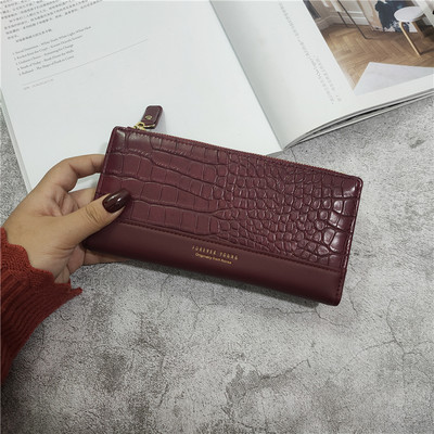 Naiste nahast rahakott kirja ja lukuga