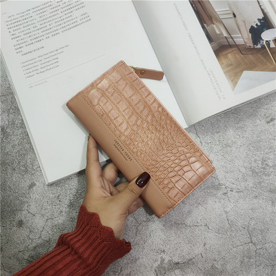 Naiste nahast rahakott kirja ja lukuga