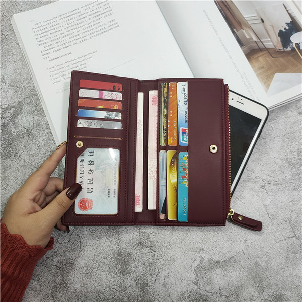 Naiste nahast rahakott kirja ja lukuga