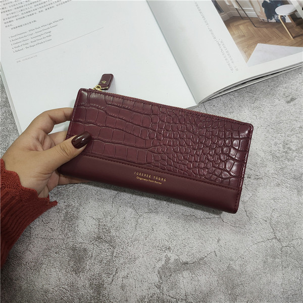 Naiste nahast rahakott kirja ja lukuga