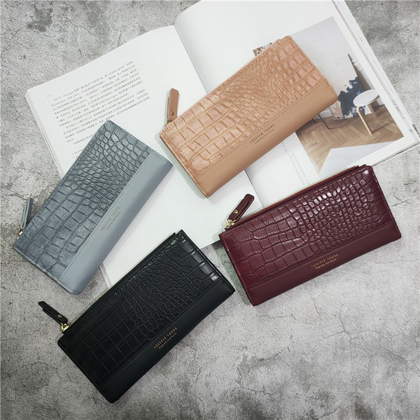 Naiste nahast rahakott kirja ja lukuga