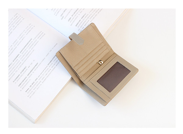 Portofel de dama modern cu inchidere metalica in patru culori