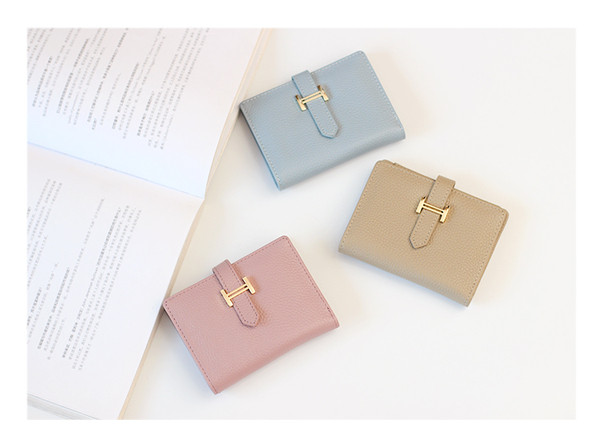 Portofel de dama modern cu inchidere metalica in patru culori