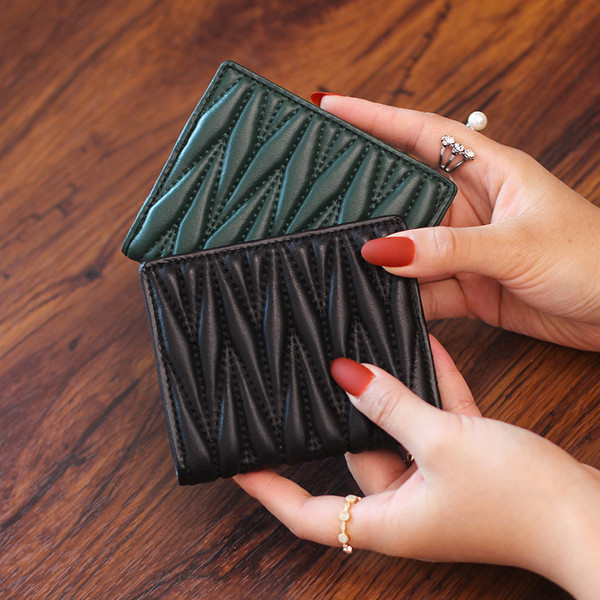 Mitmes värvitoonis metallist kinnitusega naiste igapäevane rahakott