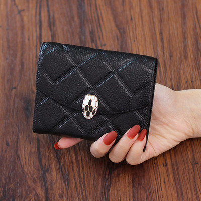 Naiste nahast rahakott metallist kaunistusega mitmes värvitoonis