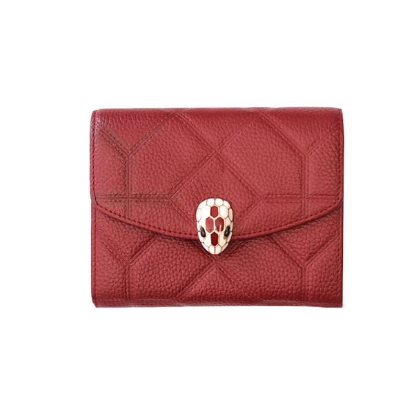 Naiste nahast rahakott metallist kaunistusega mitmes värvitoonis