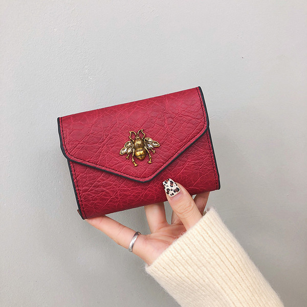 Aktuális női pénztárca fém elemmel