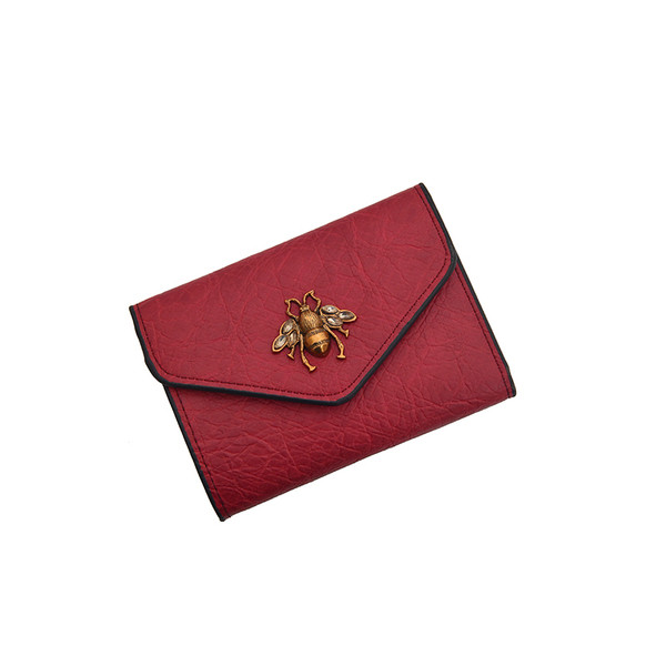 Aktuális női pénztárca fém elemmel