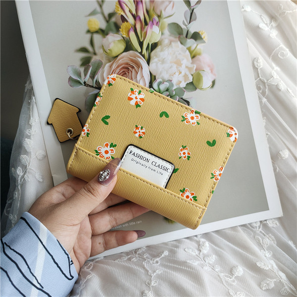 Öko-nahast valmistatud naiste vabaaja rahakott lillelise trükiga