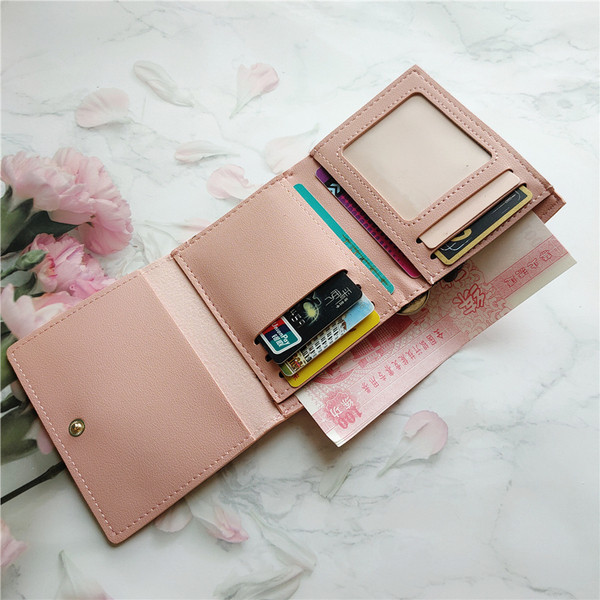 Väike naiste rahakott ökonahast metallist kaunistuse ja kirjaga