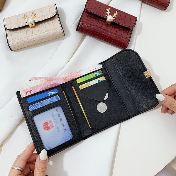 Női bőr pénztárca fém elemmel és gyöngyházzal