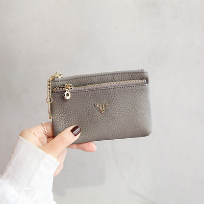 Naiste vabaaja nahast rahakott metallist kaunistuse ja lukuga