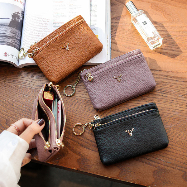 Naiste vabaaja nahast rahakott metallist kaunistuse ja lukuga