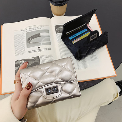 Μοντέρνο γυναικείο πορτοφόλι από οικολογικό δέρμα με αγκράφα