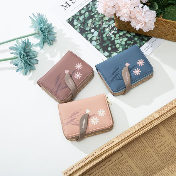 Naiste rahakott tikandi ja lukuga