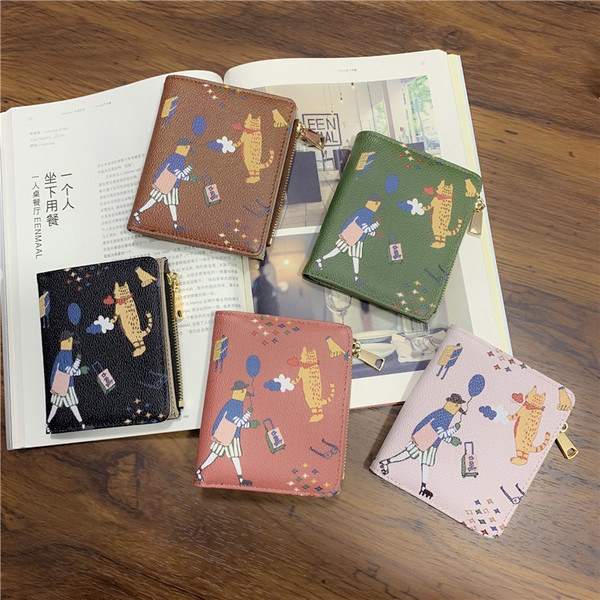 Öko-nahast värviliste aplikatsioonidega naiste rahakott