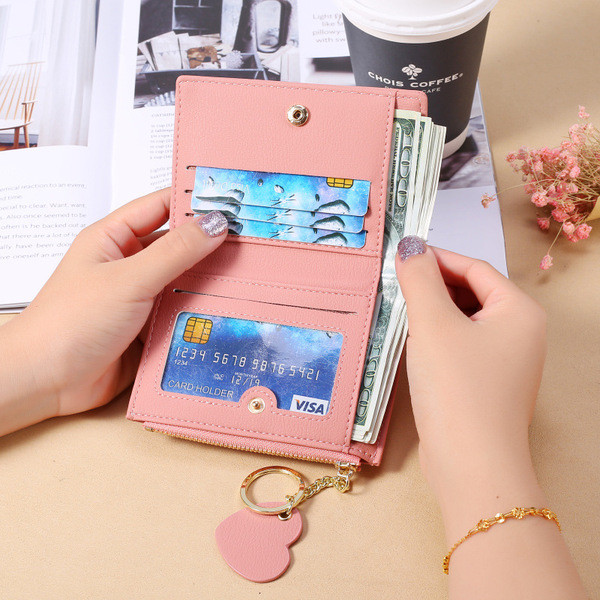 Női bőr pénztárca szalaggal és cipzárral