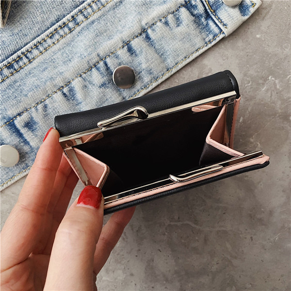 Praegune naiste rahakott tikandiga