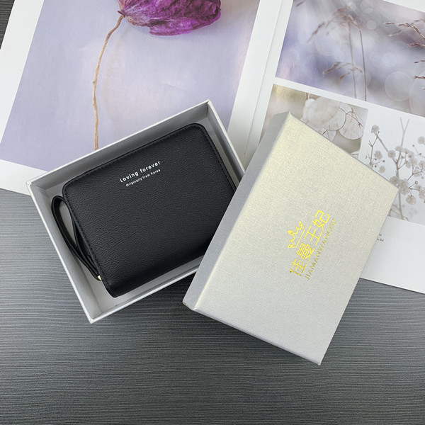 Naiste nahast rahakott kirja ja lukuga