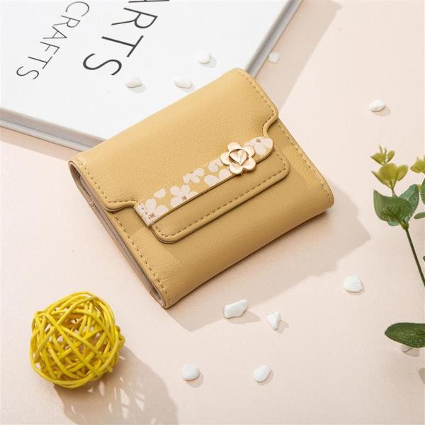 Naiste rahakott metallist lillega