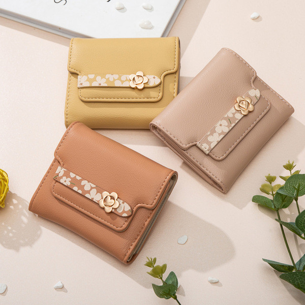 Naiste rahakott metallist lillega