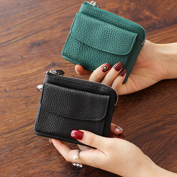 Дамски кожен портфейл с цип и преден джоб в няколко цвята