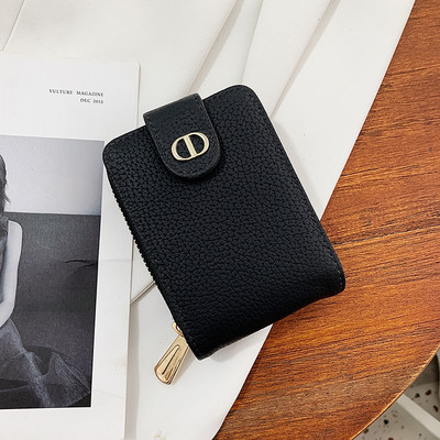 Mitmes värvitoonis lukuga naiste nahast rahakott