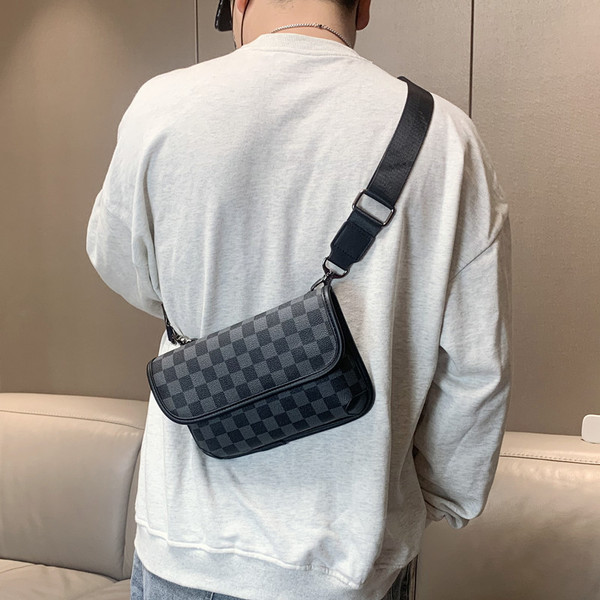 Meeste igapäevane nahast kott ja tekstiilist käepide