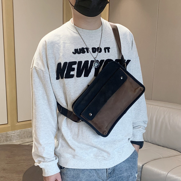 Kaasaegne pika sanga ja esitaskuga meestekott