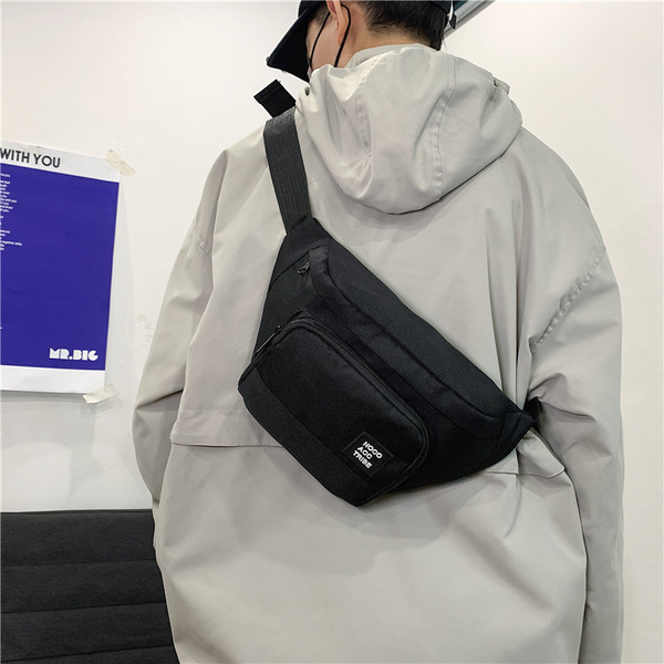 Moderna muška torba sa grbom i patentnim zatvaračem