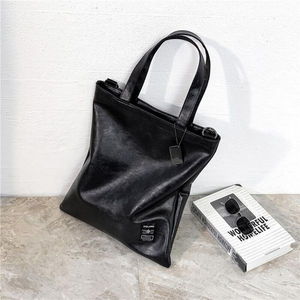 Férfi bőrtáska hosszú és rövid fülekkel, fekete színben