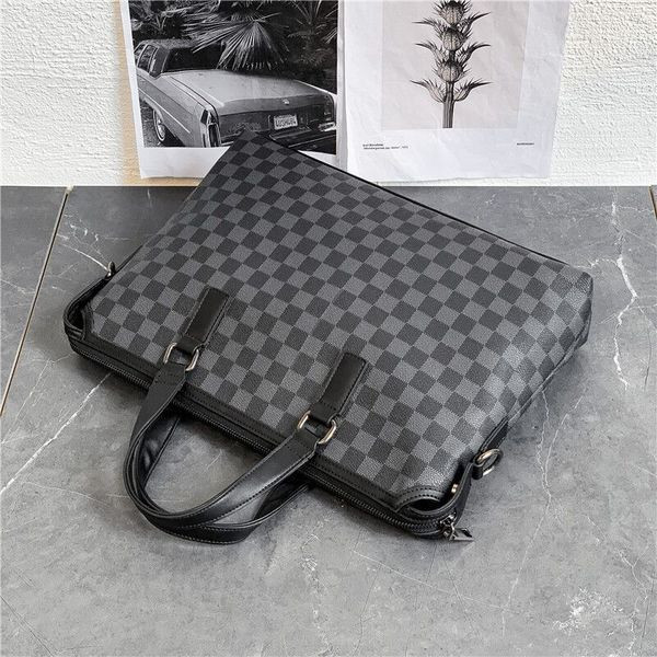 Stiilne sangadega nahast meeste kott