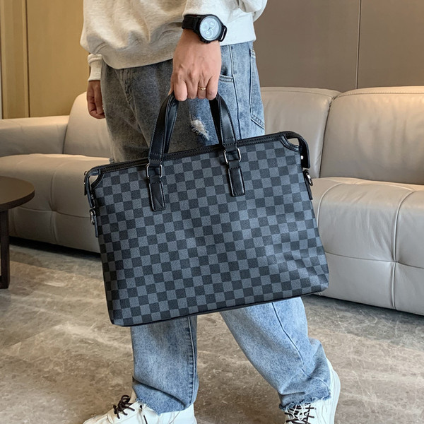 Stiilne sangadega nahast meeste kott