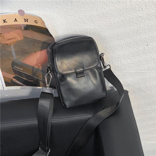 Muška torba s patentnim zatvaračem i dugom tekstilnom ručkom