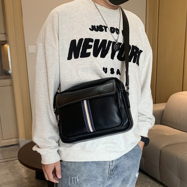 Muška kožna torba s dugom ručkom i prednjim džepom