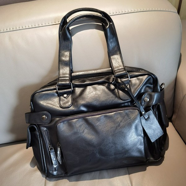 Meeste nahast kott esitasku ja käepidemetega musta värvi