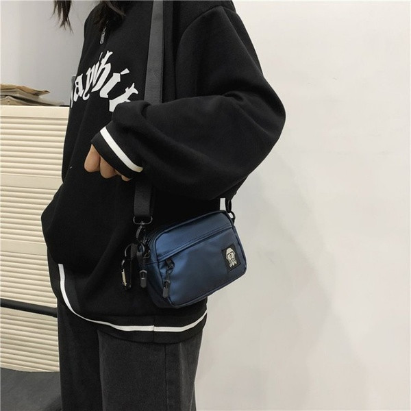 Moodne meeste kott embleemi ja pika sangaga