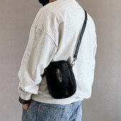 Pika sanga ja metallist kaunistusega vabaaja meeste nahkkott