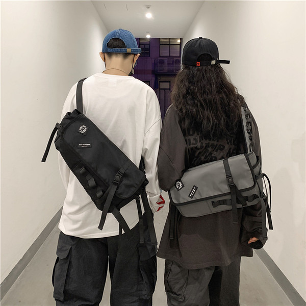 Uus mudel meeste kott embleemi ja pandlaga