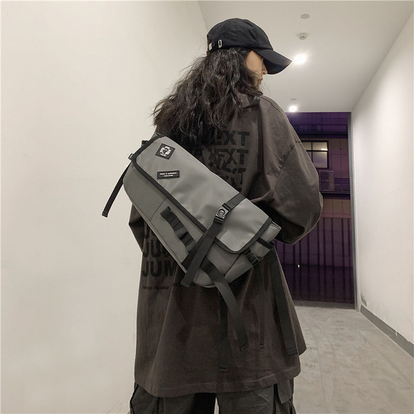 Uus mudel meeste kott embleemi ja pandlaga