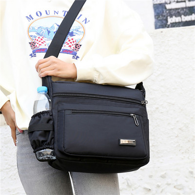 Meeste igapäevane kott luku ja embleemiga