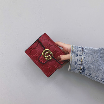 Uut mudelit metallist kinnitusega naiste rahakott