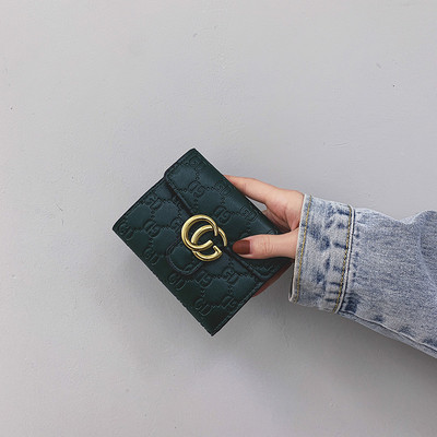 Uut mudelit metallist kinnitusega naiste rahakott