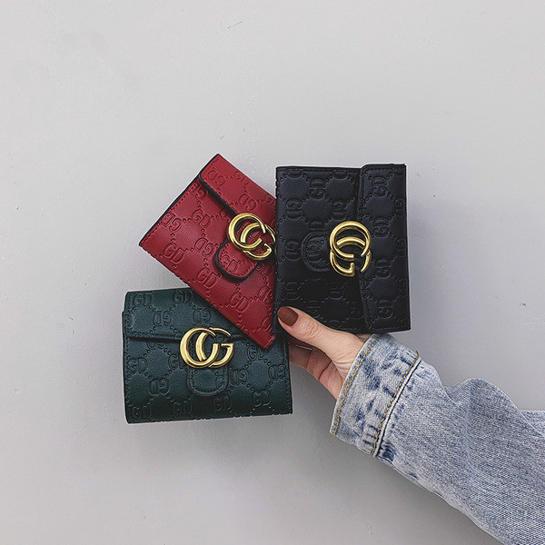 Uut mudelit metallist kinnitusega naiste rahakott