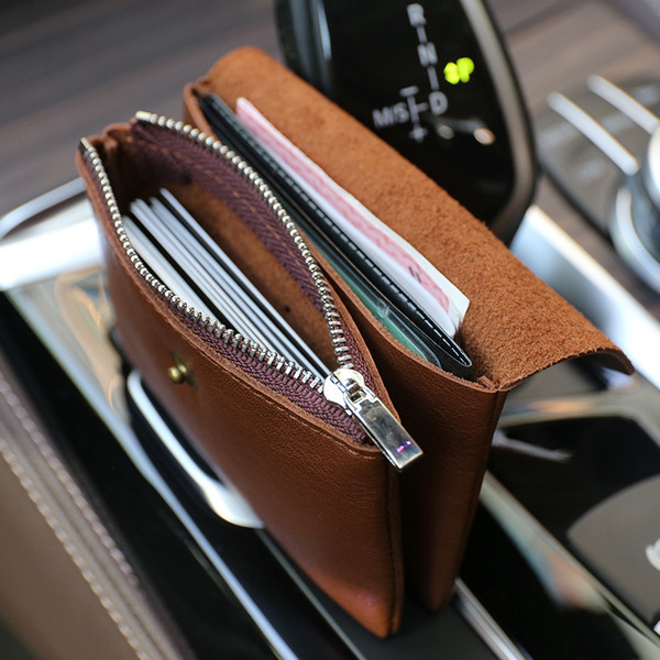 Kis bőr pénztárca fém díszítéssel