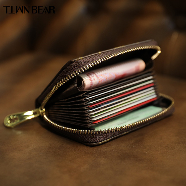 Női bőr pénztárca cipzárral és rátéttel