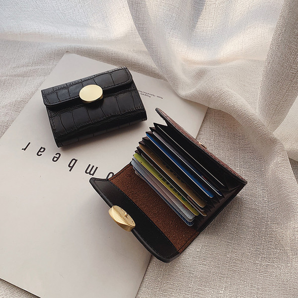 Naiste nahast rahakott metallist lukuga kolmes värvitoonis