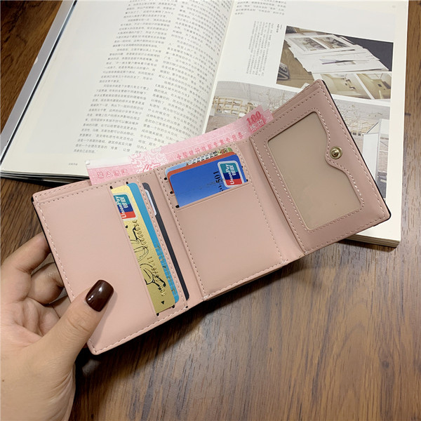 Naiste nahast rahakott metallist luku ja kirjaga