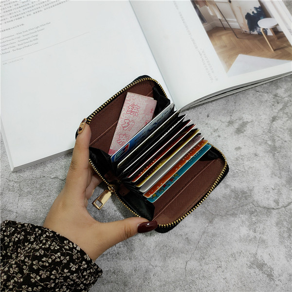 Neljas värvitoonis ökonahast lukuga naiste rahakott