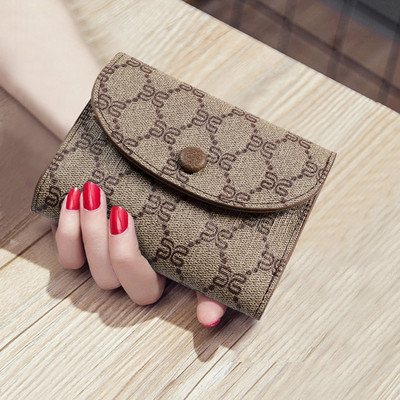 Modern kisméretű női pénztárca textilből és öko bőrből